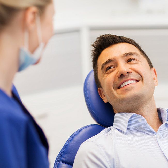 Man smiling after I V dental sedation visit
